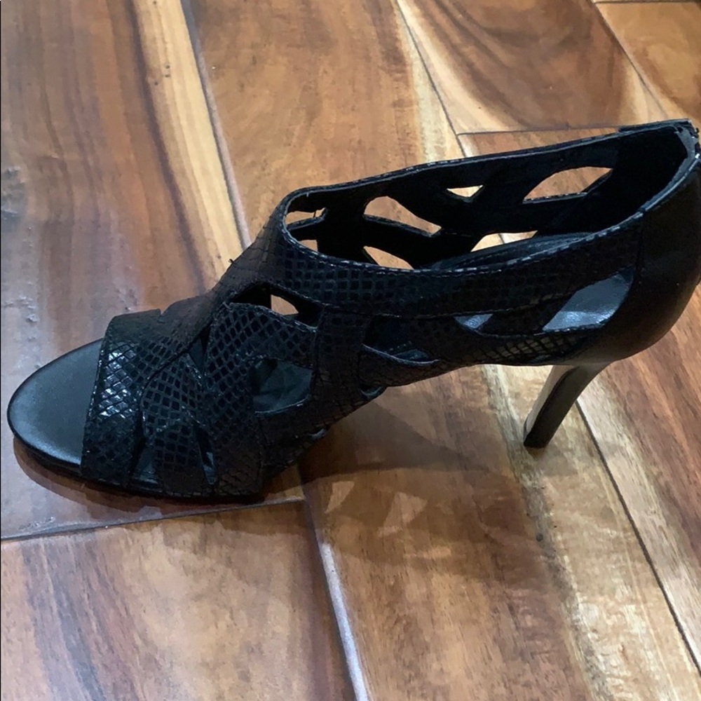 Calvin Klein peep toes stiletto booties.